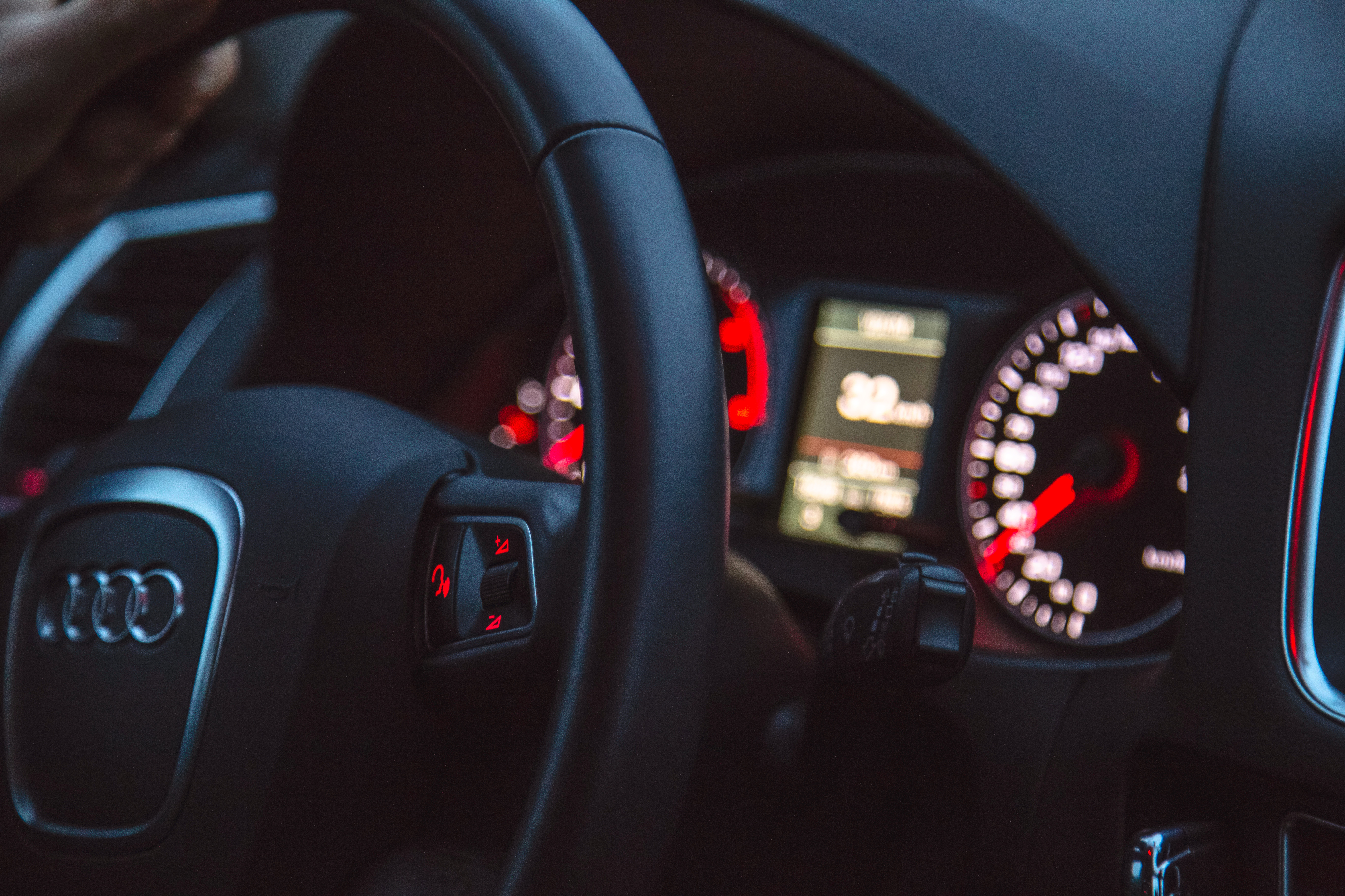 The steering wheel on an Audi used by someone who uses mobility scooter hire