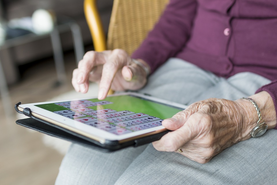Old person playing games to keep healthy