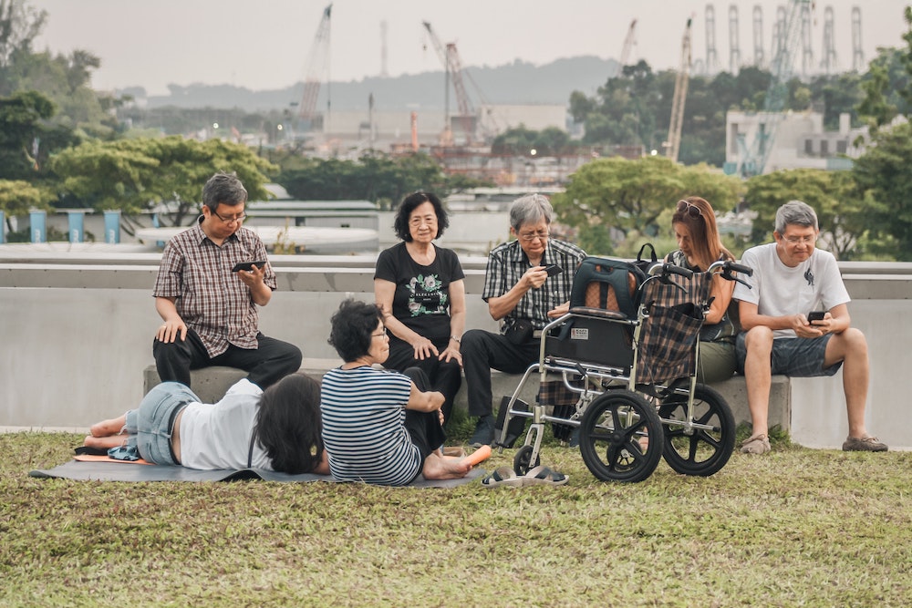 Family sat outside with wheelchair